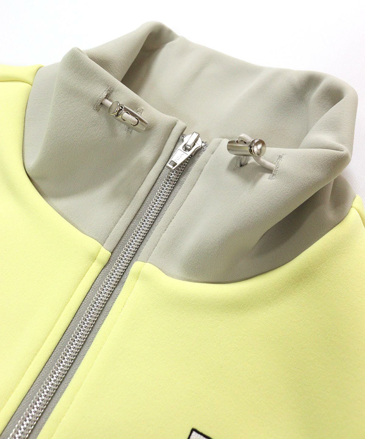 ワッペン付ジップブルゾン|ピッコーネクラブ - ゴルフウェアや婦人服通販