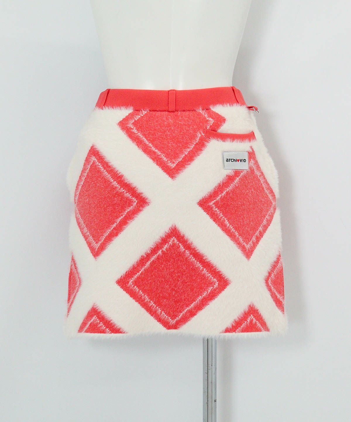 フェザーヤーン保温ニットスカート後（オレンジ）