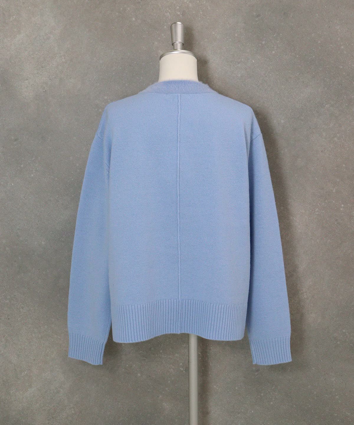 フェザーポケットウール混ニット後（ライトブルー）